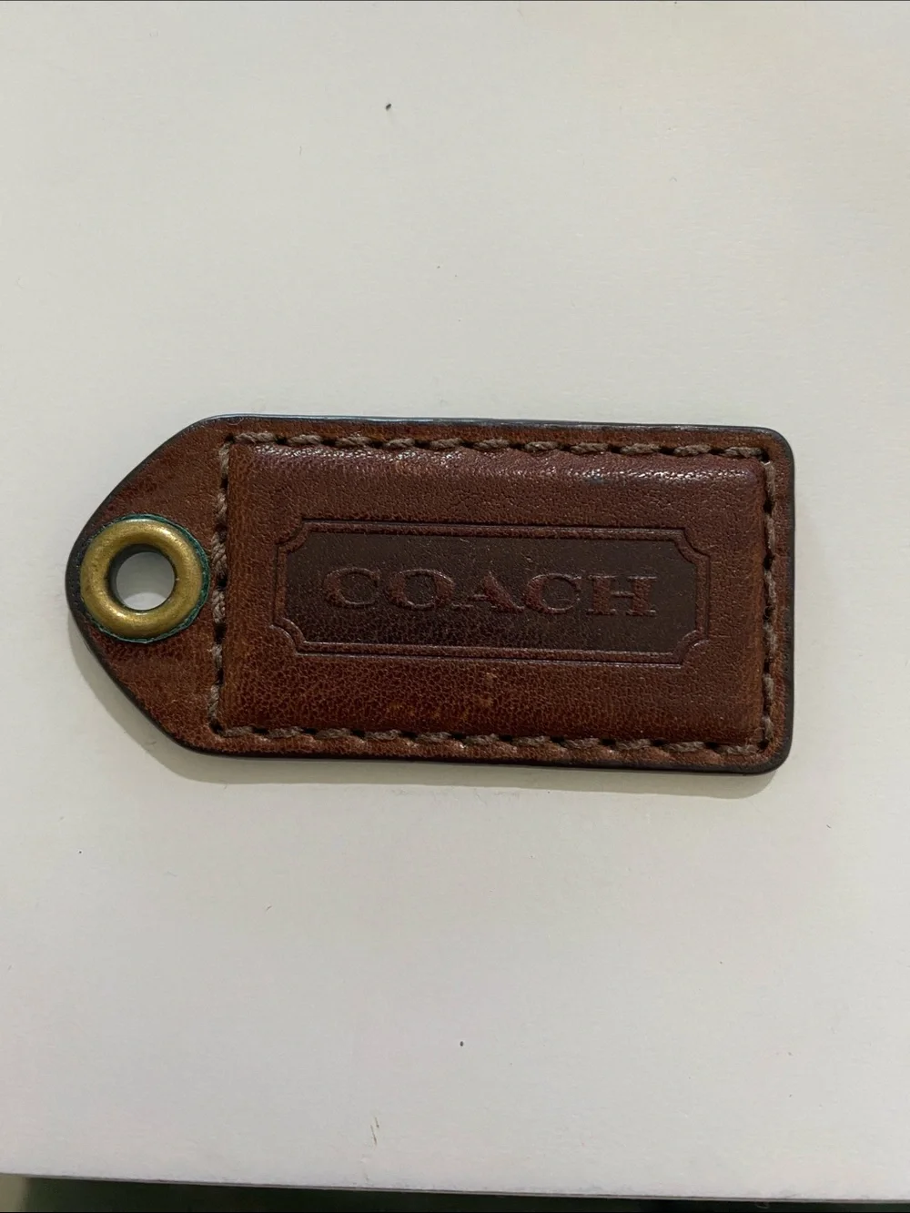 COACH Brown Leather Hang Tag with Brass Grommet
